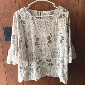 White blouse with grey and pink designs